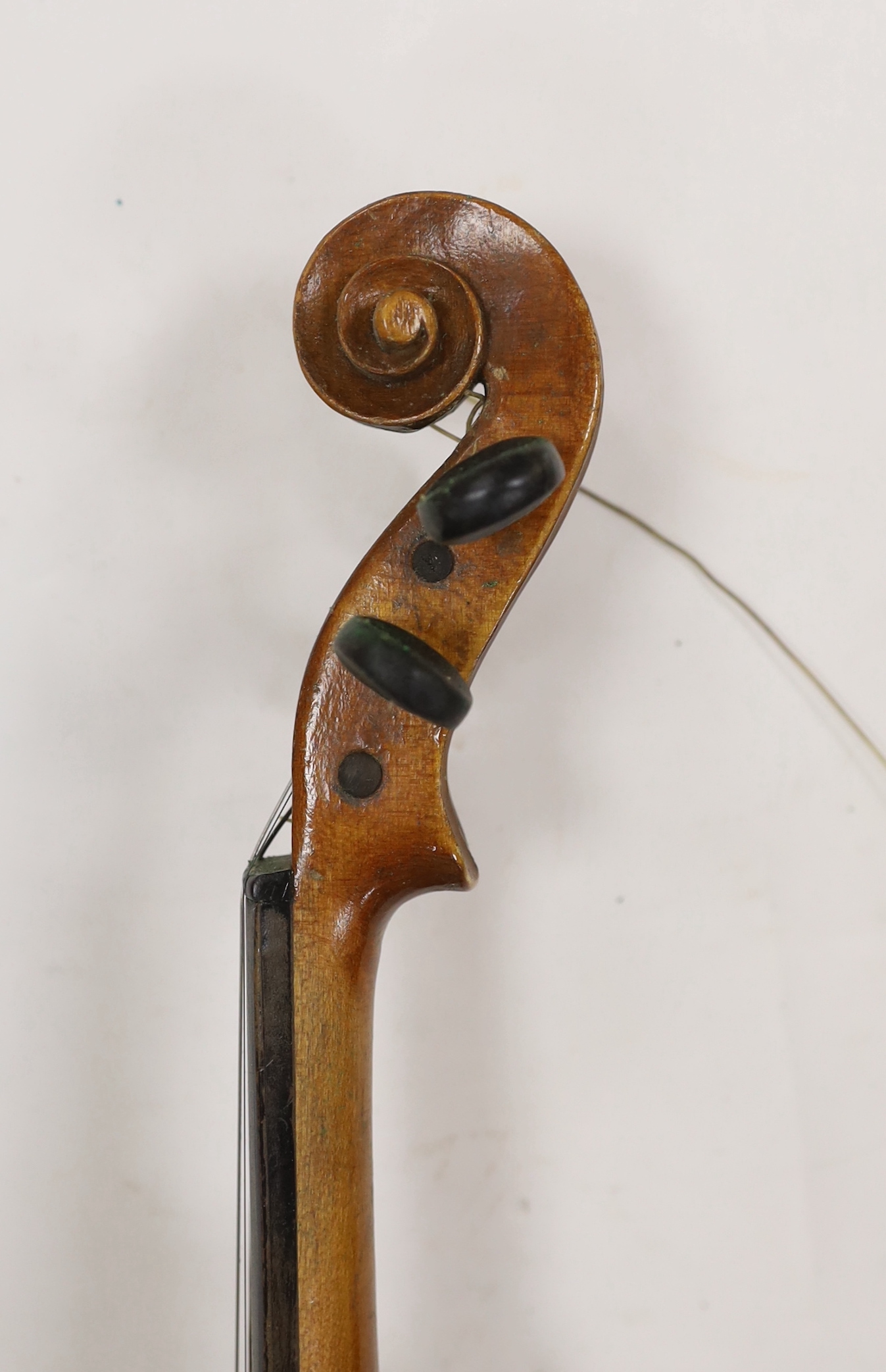Two late 19th/early 20th cased century violins